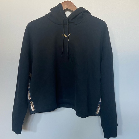 Puma Tops - 🔸 Puma 🔸 black and gold hoodie